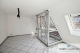 Modernisierte Dachgeschoss-Maisonette-Wohnung zentral in Renningen - Wohnzimmer