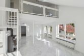 Exklusives Wohnerlebnis über den Dächern – 3,5-Zimmer-Maisonette mit Dachterrasse - Wohnzimmer